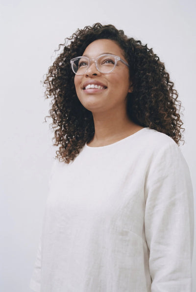 Opticalibr Halo protective glasses in Crystal, worn