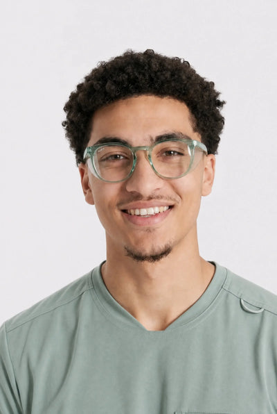 Opticalibr Halo protective glasses in Sage, worn